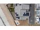 Overhead view of townhome rooftops featuring gray shingles and solar panels at 6148 Juniper Grove St, Las Vegas, NV 89148