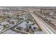 Community aerial view, featuring sidewalks, solar panels, a community pool, and contemporary home designs at 6148 Juniper Grove St, Las Vegas, NV 89148