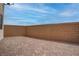 Enclosed backyard featuring brick flooring, providing a private outdoor space at 6148 Juniper Grove St, Las Vegas, NV 89148