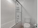 Bathroom with a tiled tub-shower combination and modern fixtures at 6148 Juniper Grove St, Las Vegas, NV 89148