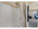 Bright bathroom with a shower-tub combo and neutral tile at 6217 Lapilli Ave, Las Vegas, NV 89139