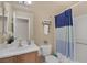 Bathroom featuring a sink vanity and a shower-tub combo at 6217 Lapilli Ave, Las Vegas, NV 89139