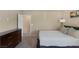 Tranquil bedroom featuring a comfortable bed, a dresser, and soft carpet floors at 6217 Lapilli Ave, Las Vegas, NV 89139
