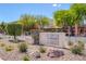 Community sign surrounded by well-maintained landscaping at 6217 Lapilli Ave, Las Vegas, NV 89139