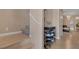 Hallway featuring hardwood floors, stairs, and a shoe rack at 6217 Lapilli Ave, Las Vegas, NV 89139