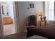 Bedroom with a view into the bathroom and a large window at 6435 Heatherton Ave, Las Vegas, NV 89110