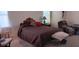 Spacious bedroom featuring a queen bed and comfortable furnishings at 6435 Heatherton Ave, Las Vegas, NV 89110