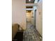 Hallway features tiled floors and access to various rooms at 6435 Heatherton Ave, Las Vegas, NV 89110