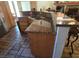 Kitchen area featuring stainless sink, countertop and barstool seating at 6435 Heatherton Ave, Las Vegas, NV 89110