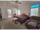 Spacious bedroom featuring carpet, ceiling fan, and decor at 6435 Heatherton Ave, Las Vegas, NV 89110