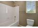 A full bathroom featuring a tub, shower, and toilet at 6442 American Eagle Ave, Las Vegas, NV 89131