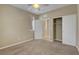 Bedroom with neutral walls, carpet, ceiling fan and a large closet at 6442 American Eagle Ave, Las Vegas, NV 89131