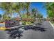 Stone community entrance sign framed by mature trees, enhancing curb appeal at 6442 American Eagle Ave, Las Vegas, NV 89131