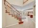 Bright and airy entryway with tiled flooring and a staircase at 6442 American Eagle Ave, Las Vegas, NV 89131