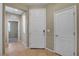 Neutral entryway featuring a white front door and tile flooring at 6442 American Eagle Ave, Las Vegas, NV 89131