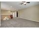 Bright and airy loft space with plush carpeting, recessed lighting, and ample natural light at 6442 American Eagle Ave, Las Vegas, NV 89131