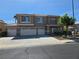 Charming two-story home with a three-car garage on a sunny day at 669 Kentons Run Ave, Henderson, NV 89052