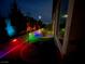 The backyard is lit with multi colored lighting at 6756 Millbury St, North Las Vegas, NV 89086