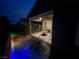 Backyard featuring a covered patio and artifical turf at 6756 Millbury St, North Las Vegas, NV 89086