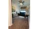 Sunlit living room featuring comfortable sofas and bright sunny windows at 6756 Millbury St, North Las Vegas, NV 89086