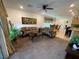 Comfortable living room with ceiling fan and decorative artwork at 6756 Millbury St, North Las Vegas, NV 89086