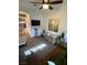 Cozy living room with birdcage, light blue sofa and accent tables at 6756 Millbury St, North Las Vegas, NV 89086