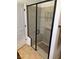 Modern bathroom with a glass enclosed shower with built in bench at 6756 Millbury St, North Las Vegas, NV 89086