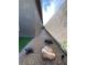 Side yard with rock ground cover and artificial turf at 6756 Millbury St, North Las Vegas, NV 89086