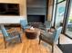 Relax with friends in this sitting area with fireplace feature at 6756 Millbury St, North Las Vegas, NV 89086