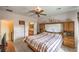Spacious bedroom featuring a bed with built-ins and an ensuite bathroom at 7824 Homing Pigeon St, North Las Vegas, NV 89084