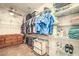 Organized walk-in closet with shelving, hanging rods, and ample storage space at 7824 Homing Pigeon St, North Las Vegas, NV 89084