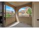 Covered outdoor patio offers a view of the neighboring building and a peek of blue sky at 7950 W Flamingo Rd # 2019, Las Vegas, NV 89147