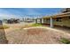 Large, open backyard space, offering potential for customization and landscaping with a covered patio at 804 Cherry Dr, Henderson, NV 89002