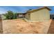 Backyard area with covered patio offering potential for outdoor living and entertaining space at 804 Cherry Dr, Henderson, NV 89002