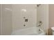 Bathroom featuring a tiled tub and shower at 804 Cherry Dr, Henderson, NV 89002
