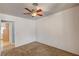 Empty bedroom with carpet flooring and a wood-blade ceiling fan at 804 Cherry Dr, Henderson, NV 89002