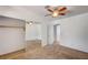 Bedroom with mirrored closet and ceiling fan at 804 Cherry Dr, Henderson, NV 89002
