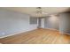 Large living room with hardwood floors, a neutral color scheme, and ample natural light at 804 Cherry Dr, Henderson, NV 89002