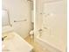 Bathroom featuring a shower-tub combo and a marble-style sink at 810 E Calvada Blvd, Pahrump, NV 89048