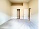 Bright, carpeted bedroom with a closet and neutral paint, offering a serene atmosphere at 8161 Cane Creek Mill Ct, Las Vegas, NV 89131