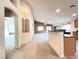 Spacious living area with neutral colors, arched doorways, and plenty of natural light at 8161 Cane Creek Mill Ct, Las Vegas, NV 89131