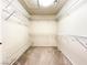 Walk-in closet with wall-to-wall shelving for optimal storage and organization at 8161 Cane Creek Mill Ct, Las Vegas, NV 89131