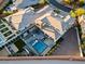 Stunning aerial view of a modern home with a pool, jacuzzi, and spacious backyard at 82 Glade Hollow Dr, Las Vegas, NV 89135