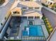 Aerial view of a luxury home with a pool, outdoor kitchen, and landscaped backyard at 82 Glade Hollow Dr, Las Vegas, NV 89135