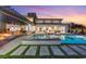 Luxurious backyard showcasing a pool, outdoor kitchen, and elegant patio, designed for upscale entertaining and relaxation at 82 Glade Hollow Dr, Las Vegas, NV 89135