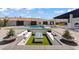 Entertainer's backyard with a swimming pool, water feature, and comfortable seating areas at 82 Glade Hollow Dr, Las Vegas, NV 89135