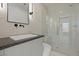Modern bathroom featuring a sleek vanity and a frameless glass shower at 82 Glade Hollow Dr, Las Vegas, NV 89135