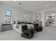 Elegant main bedroom suite with sitting area, modern decor, and plenty of natural light at 82 Glade Hollow Dr, Las Vegas, NV 89135