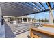Relaxing outdoor area with a fire pit, swing, and view of the pool at 82 Glade Hollow Dr, Las Vegas, NV 89135