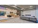 Expansive outdoor living area with modern fireplace, comfortable seating, and seamless indoor-outdoor flow at 82 Glade Hollow Dr, Las Vegas, NV 89135